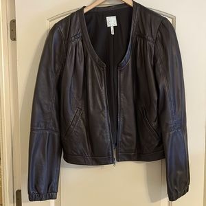 Black leather bomber jacket. Never worn.